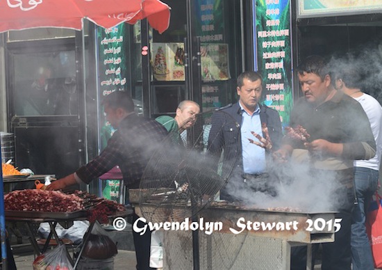 Cooking the Meat Al Fresco, Urumqi, Xinjiang, China, Photographed by Gwendolyn Stewart, c. 2015; All Rights Reserved